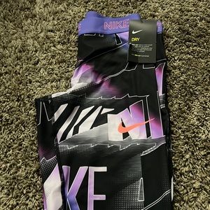 Excellent condition- Youth girls XL Nike “training” pants. Never worn. With tags